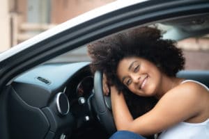 Woman Driver Portrait at Car Interior - Pride