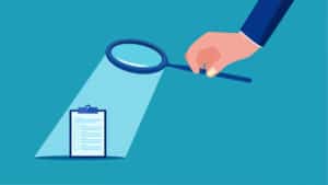 Looking over the contract - illustration of a magnifying glass shining light onto the documents